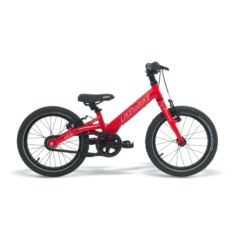 a red children's bike on a white background