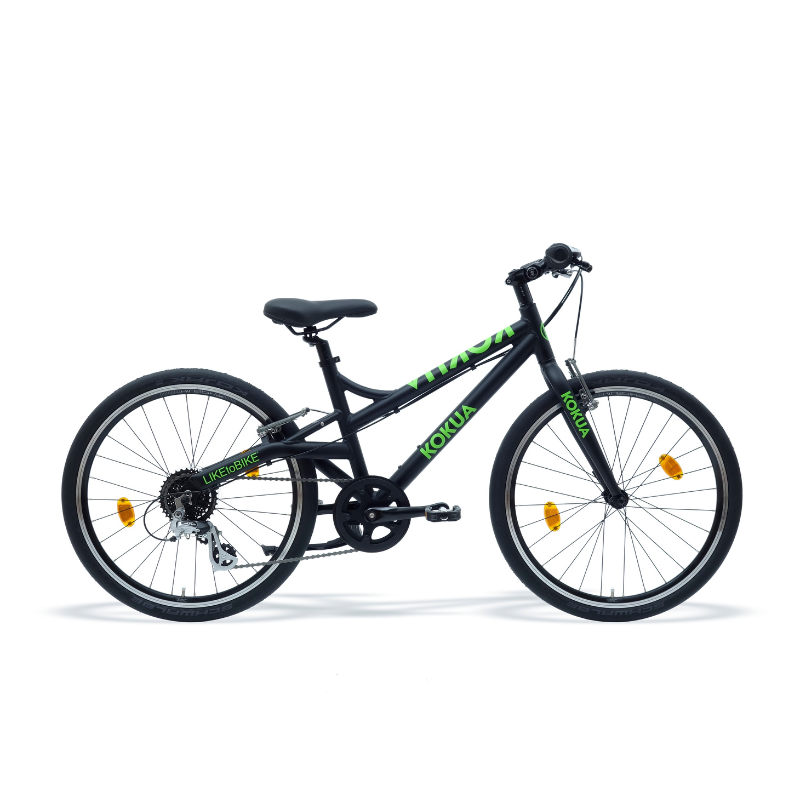 a black and green KOKUA like to bike 24SR bike on a white background