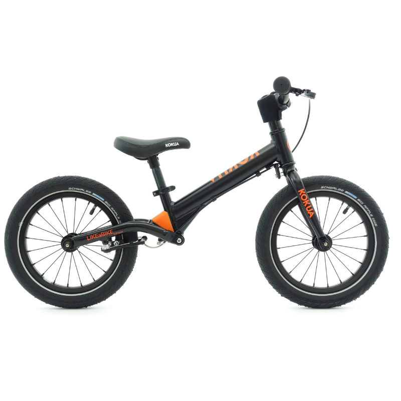 a black and orange KOKUA Jumper 14 balance bike on a white background